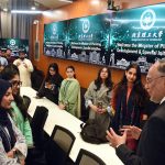 Federal Minister for Planning, Development and Special Initiatives, Professor Ahsan Iqbal, interacting with Pakistani students at Beijing Institute of Technology