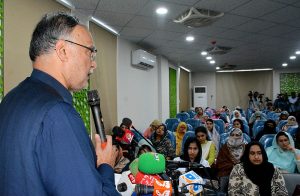 Federal Minister for Planning, Development and Special Initiatives, Professor Ahsan Iqbal, addressing the National Women Seerat Conference at Nisar Fatima Institute of Sirah and Women Studies (NFISWS).