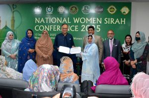 Federal Minister for Planning, Development and Special Initiatives, Professor Ahsan Iqbal, addressing the National Women Seerat Conference at Nisar Fatima Institute of Sirah and Women Studies (NFISWS).