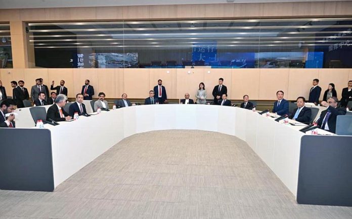 President Asif Ali Zardari visiting the Urban Operations and Management Centre in Urumqi, accompanied by the Mayor of the city and the Vice Governor of Xinjiang