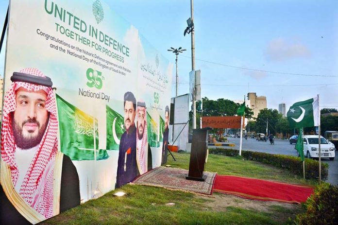 Posters of Saudi Crown Prince Muhammad bin Salman and Sindh Governor Kamran Tessori displayed on Governor House Road to mark Saudi Arabian National Day and the signing of the Mutual Strategic Defence Agreement between Pakistan and Saudi Arabia