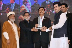 Chairman Senate Syed Yousaf Raza Gilani and Former Senate Chairman Mian Muhammad Soomro giving award during 17th Rice Export Trophy Awards organized by the Rice Exporters Association of Pakistan (REAP)