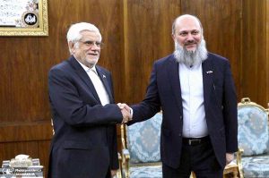 Federal Minister for Commerce Jam Kamal Khan shakes hand with Iran’s First Vice President Mohammad-Reza Aref in Tehran ahead of talks on enhancing bilateral trade and economic cooperation