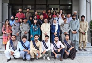 A delegation of Islamabad Traffic Police's FM 92.4 Radio headed by its Station Director & Director Special Initiatives, Aisha Jamil in a group photograph with Managing Director Associated Press of Pakistan, Muhammad Asim Khichi during a visit to the APP Headquarters