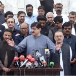 Sindh Chief Minister Syed Murad Ali Shah, flanked by cabinet members, addresses the media at Mazar-e-Quaid