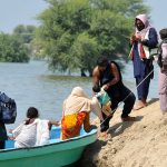 Residents evacuate to safer places as rising waters from several rivers inundate parts of South Punjab.
