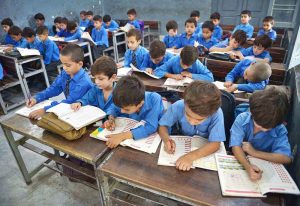 Students attend their class on International Literacy Day at Government Shaheed Wahabuddin High School, Salwan Cantt.