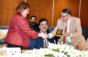 Senator Sarmad Ali, Chairman of the Pakistan-Italy Parliamentary Friendship Group presenting a souvenir to Italian Ambassador to Pakistan, Mrs. Marilina Armellin at a luncheon hosted in her honor.
