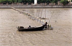 Shacks, houses and animal shelters were submerged by the flood relay from the Indus River near Mehboob Kalhoro village.