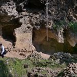 The Buddha Caves at Shah Allah Ditta are located in the heart of Margalla Hills on the natural route to the ancient city of Taxila. These caves are believed to be 2,400 years old. The Buddha caves are adjacent to a garden known as Sadhu ka Bagh. The village of Shah Allah Ditta is named on a dervish of Mughal era. The Buddha Caves consist of natural rock of Kanjur stone. The Kanjur stone used for the construction of Buddhist Stupa at Ban Faqiran, was also extracted from these rocks. These caves were first used by Buddhist monks for meditation. After the decline of Buddhism in Taxila. Hindu sadhus occupied these caves and painted some images of Hindu deities on the walls. There were many Hindu families living in Shah Allah Ditta Village before partition and the Caves were used by them for their daily worship. During the Mughal Period, Muslim ascetics took over the caves and built a square water tank on the water channel emerging from a natural water spring flowing since long. The water tank was constructed in lime stone laid in lime mortar. Mughal rulers and other emperors often passed through this region on their way to India from Afghanistan