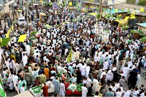 A large number of people participating in the Eid Milad-un-Nabi procession at the Jinnah Bagh Road