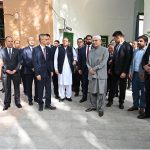President Asif Ali Zardari being briefed by Imam Maimaiti Juben about the Etigar Mosque, in Kashgar, Xinjiang, China, alongside CPC Party Secretary of Kashgar Yao Ning
