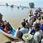 Residents being evacuated by rescue teams and boats to safer areas as rising waters from rivers submerge parts of South Punjab