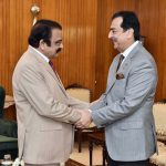 Acting President Syed Yousuf Raza Gilani shakes hands with Senator Rana Sanaullah Khan at Aiwan-e-Sadr, in federal capital