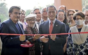 Ambassador of Japan to Pakistan, Akamatsu Shuichi, cuts the ribbon to inaugurate the exhibition “Remains of Ruins” showcasing sculptures, paintings, and ceramic works of renowned artist Ustad Bashir Ahmad at Sir Syed Art Gallery, organized by Silk Road Culture Center in honour of the victims of Hiroshima and Nagasaki.