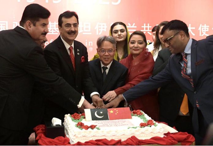 Senate Chairman Syed Yousaf Raza Gilani along with Ambassador of China H.E. Mr. Jiang Zaidong cutting a cake to celebrate the 76th anniversary of the founding of the People’s Republic of China at a local hotel