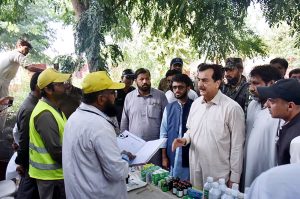 Chairman Senate Syed Yousuf Raza Gilani talking to media at Ghalloo School, Jhok Wains, where flood relief camps have been established