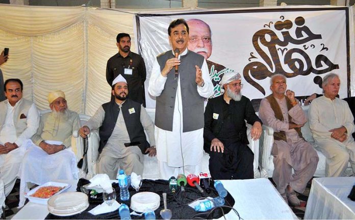 Chairman Senate Syed Yousaf Raza Gillani addressing during Chehlum ceremony of his cousin, former MNA Syed Tanveer-ul-Hassan Gillani, at Islamia Kindergarten School