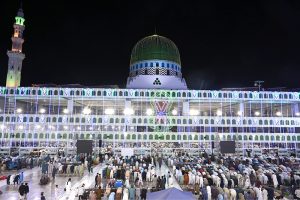 An illuminated view of Faizan-e-Madina Masjid decorated with colorful lights as the city prepares to celebrate the blessed occasion of 12th Rabi-ul-Awwal, Eid Milad-un-Nabi (SAWW)