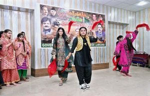 Students Performing Tableau in connection with Defence Day at Government Girls Degree College.