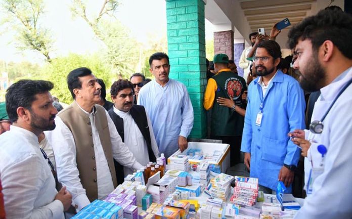 Acting President Syed Yousuf Raza Gilani visiting a medical camp in the flood-affected area