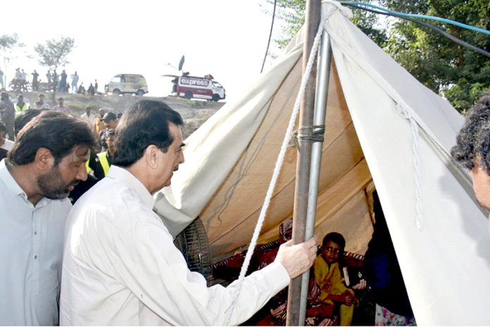 Chairman Senate Syed Yousuf Raza Gilani inspects relief camps for flood-affected people in Multan