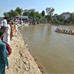 Residents being evacuated by rescue teams and boats to safer areas as rising waters from rivers submerge parts of South Punjab