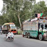 A view of loaded trucks with belongings of Afghan refugees outside the UNHCR Voluntary Repatriation Center, waiting to transport families to their homeland of Afghanistan after four decades