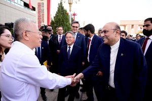 President Asif Ali Zardari being welcomed by Kashgar University Party Secretary Mr Ding Bangwen, faculty and students during his visit to the University