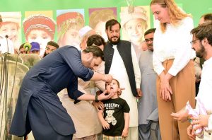 Federal Minister for Health, Syed Mustafa Kamal, inaugurates the Polio Eradication Programme by administering polio drops to children.