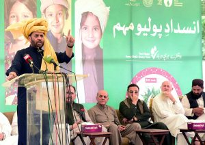 Federal Minister for Health, Syed Mustafa Kamal, inaugurates the Polio Eradication Programme by administering polio drops to children.