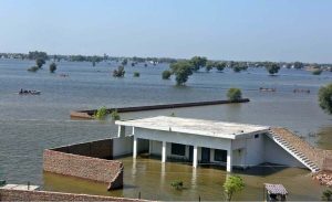 Residents being evacuated by rescue teams and boats to safer areas as rising waters from rivers submerge parts of South Punjab