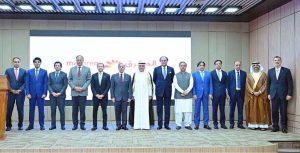 Prime Minister Muhammad Shehbaz Sharif in a group photo with Abdul Aziz Al Ghurair, Chairman Mashreq Bank.