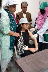 A girl is HPV vaccinated on the Presence of the Sindh Minister for Health, Dr. Azra Fazal Pechuho during the inauguration of a special HPV Vaccination Site at the Karachi Press Club