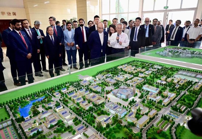 President Asif Ali Zardari being briefed on the academic and cultural role of Kashgar University