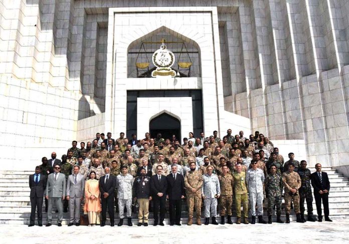 Chief Justice of Pakistan, Mr. Justice Yahya Afridi, in a group photo with the delegation of the National Security & War Course 2026 from the National Defence University (NDU), at the Supreme Court of Pakistan