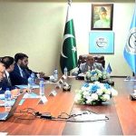 Ambassador (R) Farukh Amil, Chairperson IPO Pakistan, addressing the IPRE-CMS inauguration meeting at IPO Karachi office