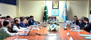 Ambassador (R) Farukh Amil, Chairperson IPO Pakistan, addressing the IPRE-CMS inauguration meeting at IPO Karachi office