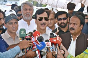 Chairman Senate Yusuf Raza Gilani addressing to media persons after reviewing facilities during his visit to a flood relief camp.
