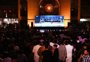 Fans watch the India-Pakistan Asia Cup T20 cricket match on a big screen at Port Grand. APP/SDQ/FHA
