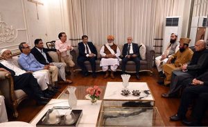 Federal Minister for Board of Investment Qaiser Ahmed Sheikh in a meeting with the business community, Jamiat Ulema-e-Islam (JUI) chief Maulana Fazlur Rehman also present in the meeting