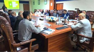 Ambassador (R) Farukh Amil, Chairperson IPO Pakistan, addressing the IPRE-CMS inauguration meeting at IPO Karachi office