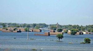 Rescue 1122 Boats carrying residents evacuates people from flooded areas after rising river water submerged villages