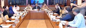 Senator Nasir Mahmood, Chairman Senate Standing Committee on Housing and Works, presiding over a meeting of the committee at Parliament House.