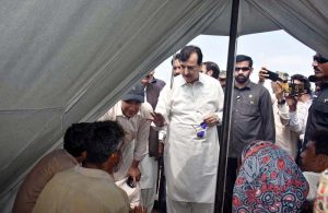 Chairman Senate Yusuf Raza Gilani addressing to media persons after reviewing facilities during his visit to a flood relief camp.