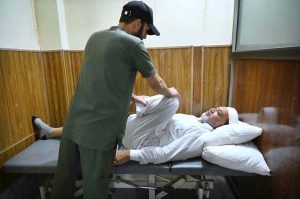 A physiotherapist at LRH is working with a patient to support recovery, strength, and independence on World Physiotherapy Day.
