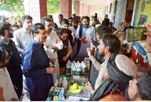 Chairman Senate Syed Yusuf Raza Gilani addressing to media persons after reviewing facilities during his visit to a flood relief camp at Sher Shah.