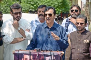 Chairman Senate Syed Yusuf Raza Gilani addressing to media persons after reviewing facilities during his visit to a flood relief camp at Sher Shah.