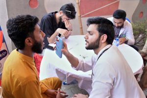 Doctors examine and treat patients at a free medical camp in Village Khoje Chak, organized by the Shed Trust to provide healthcare facilities to flood-affected residents.