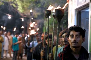 People carry torches (Mashal) participating in a march (Mashal Bardar Jaloos) on the eve of Eid-e-Milad-un-Nabi SAAW the commemoration of the birth anniversary of Prophet Mohammed SAAW